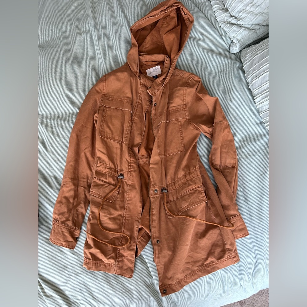 Gently worn hooded jacket